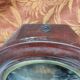 Small round bull's eye wall display case in wood and curved glass