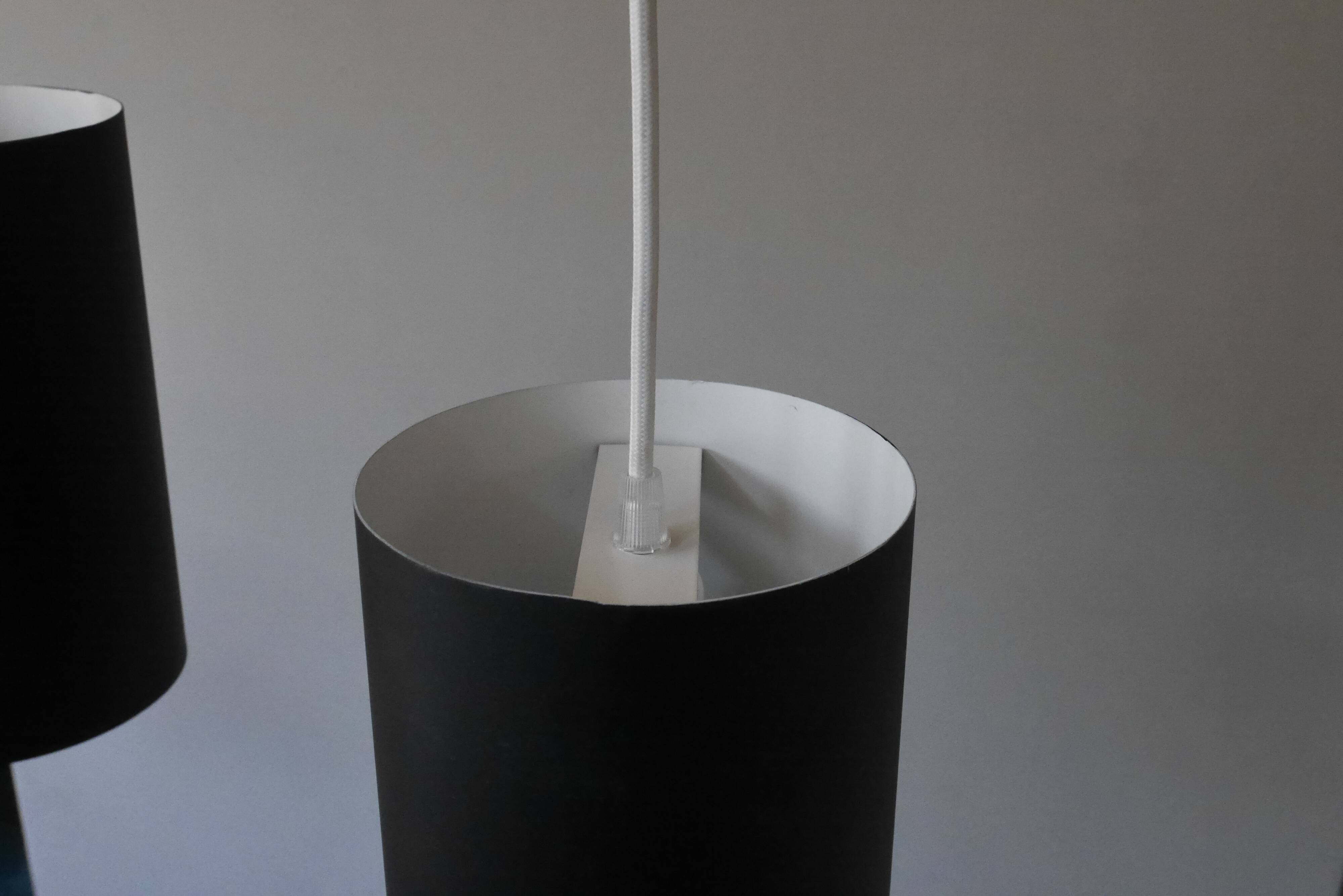 Pair of black metal scandinavian hanging lamps Poulsen