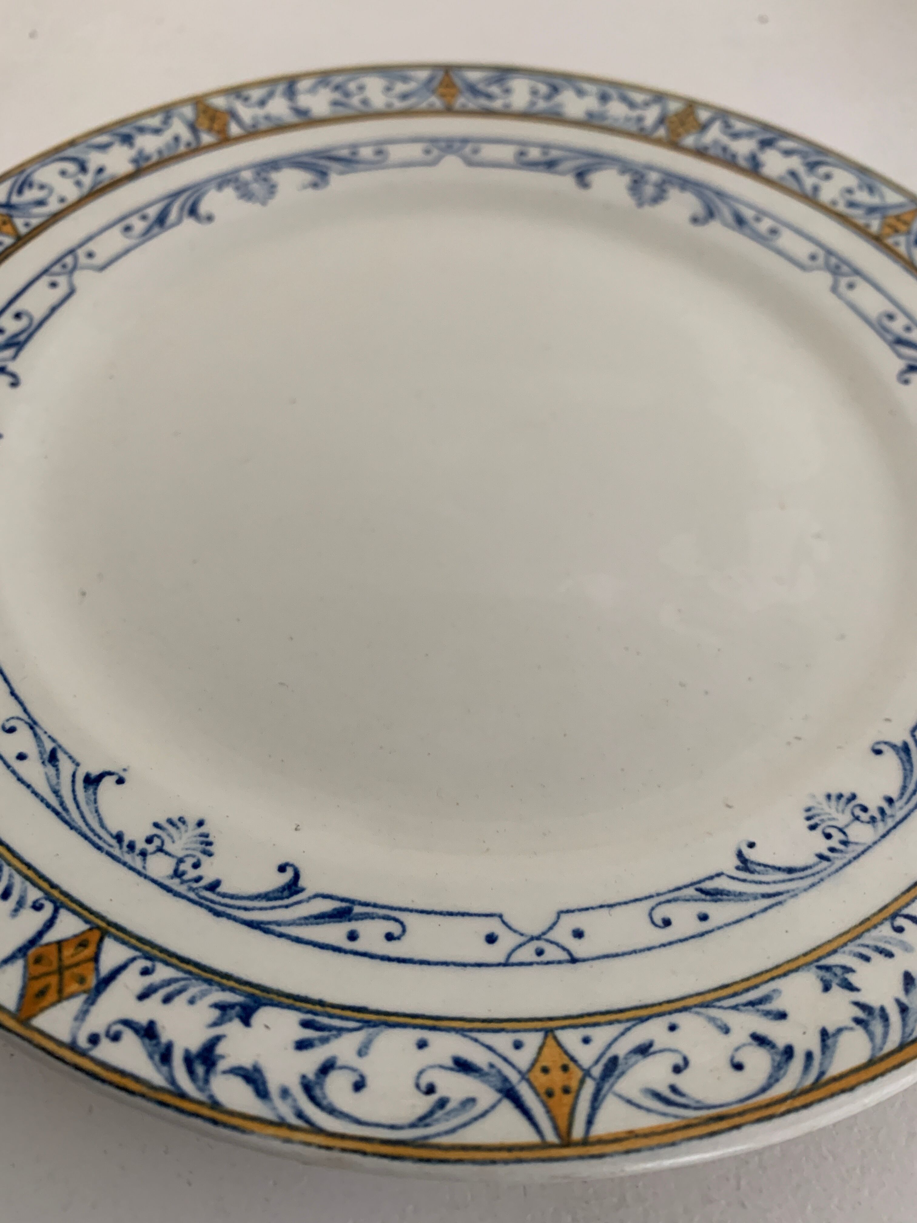 11 old Creil and Montereau dessert plates, Colbert service