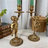 Pair of bronze “Cherubim” candlesticks
