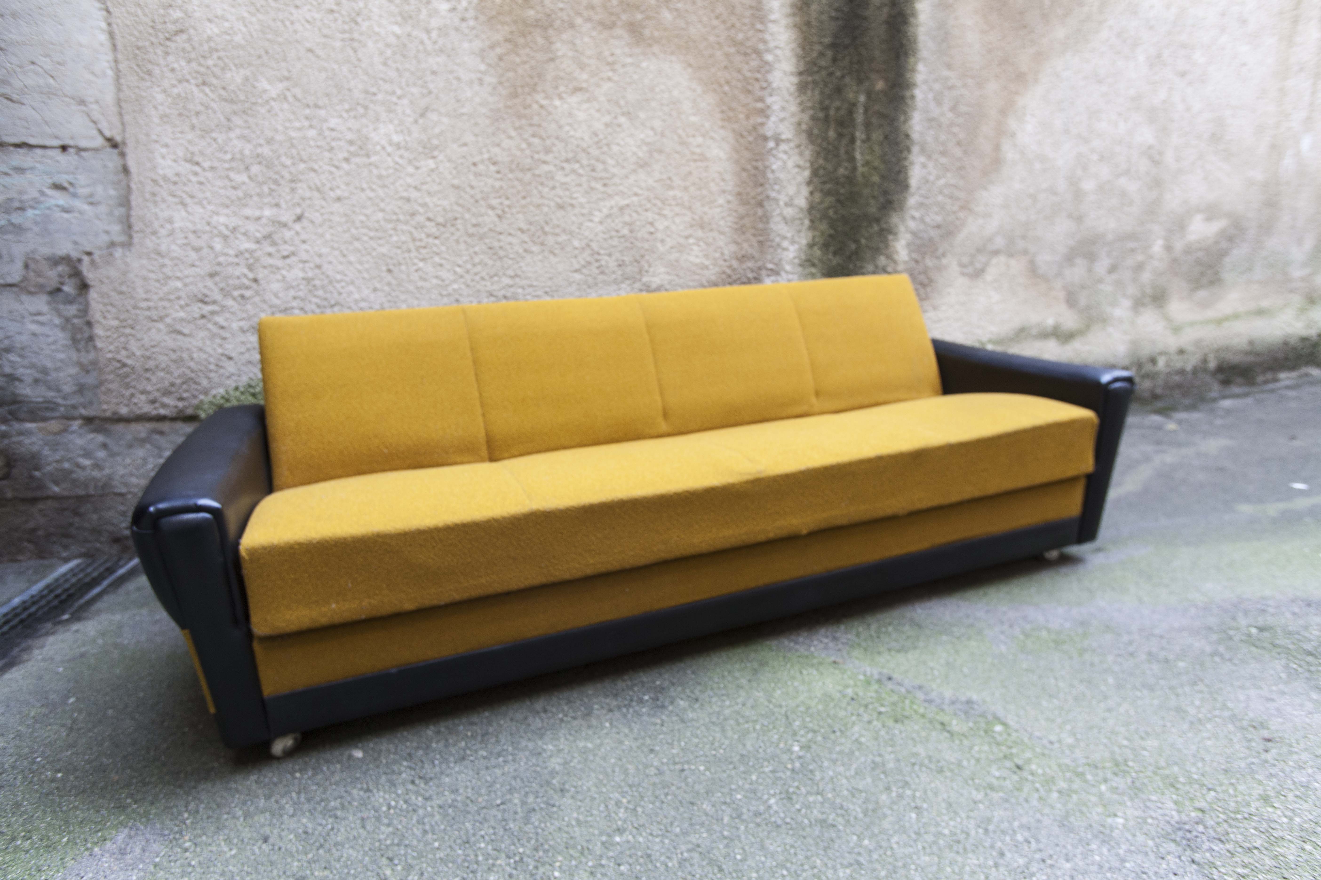 The 1970s gold and black Daybed couch
