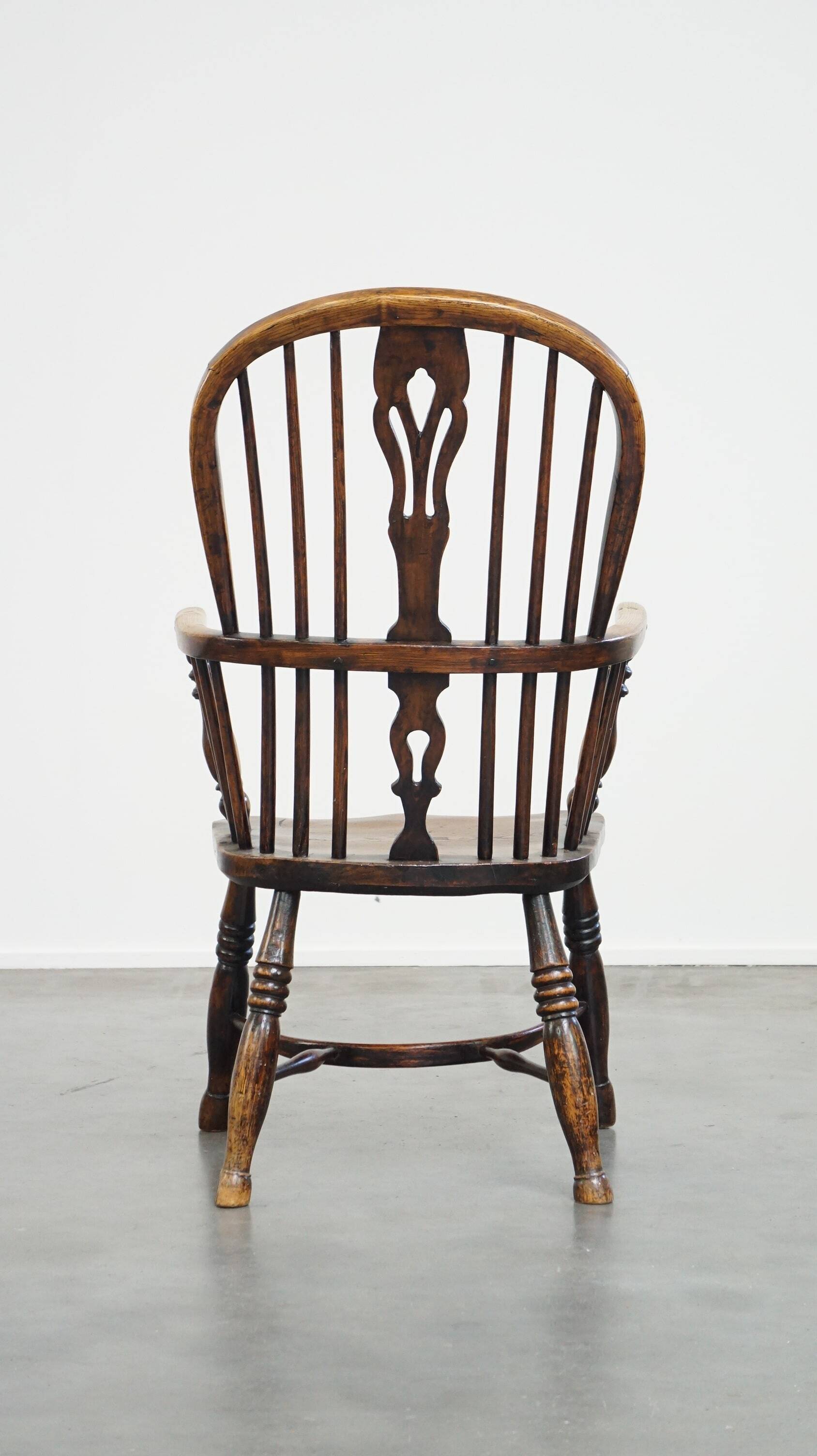Beautiful, practical antique English highback Windsor chair with a lovely patina