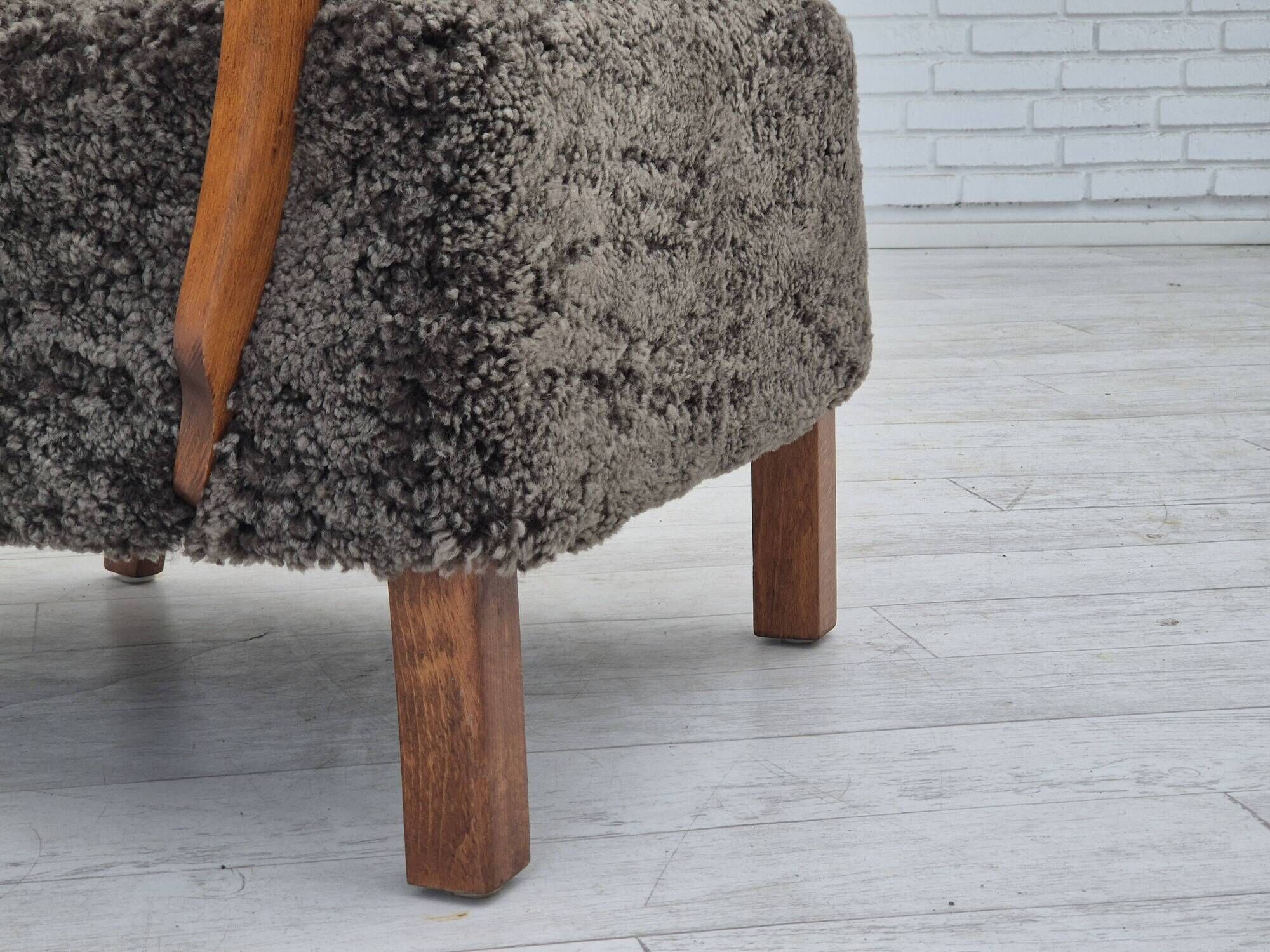 1960s, completely reupholstered Danish art deco armchair, genuine sheepskin "Wellington".