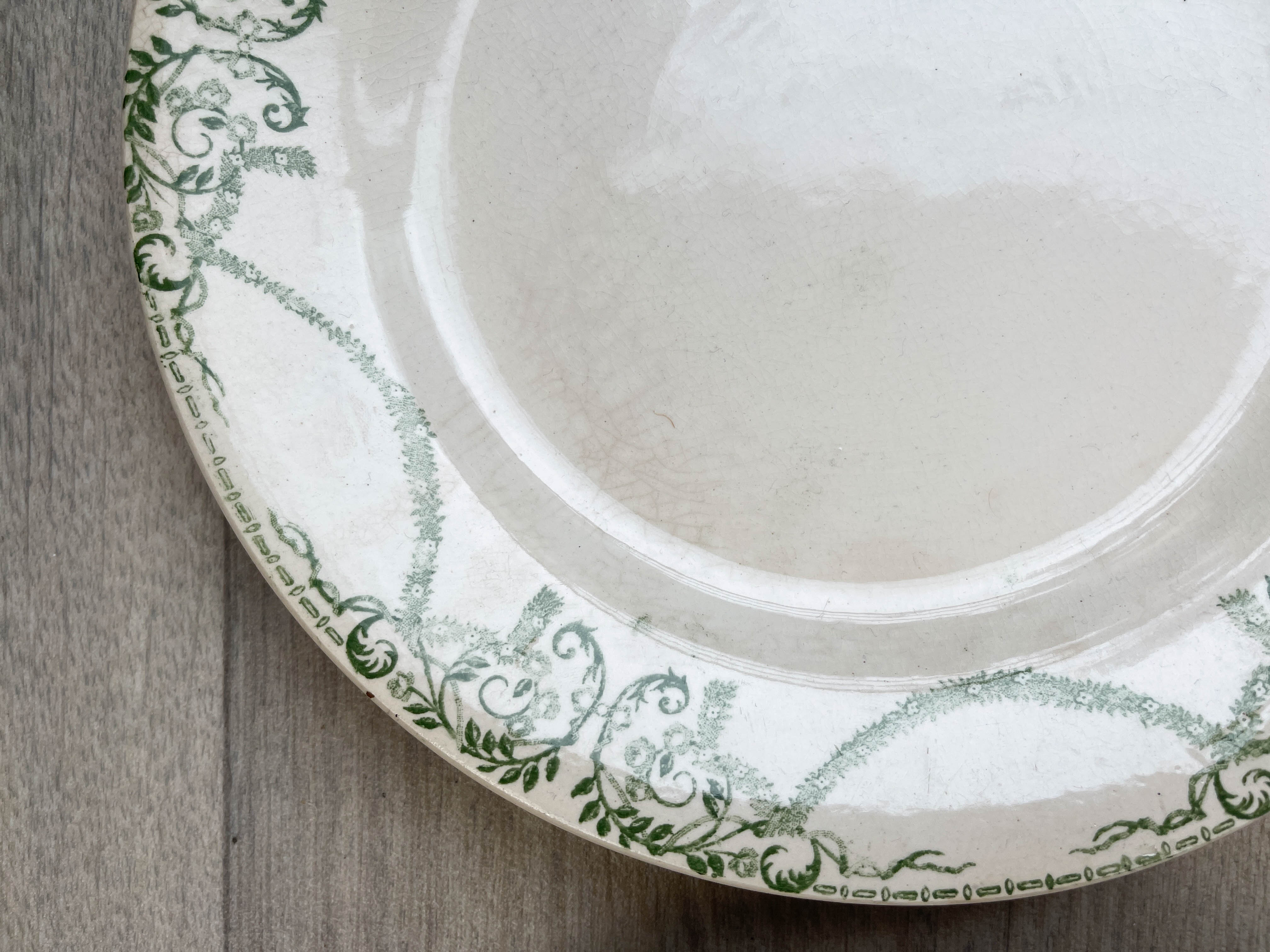 6 green and blue mismatched iron earth plates