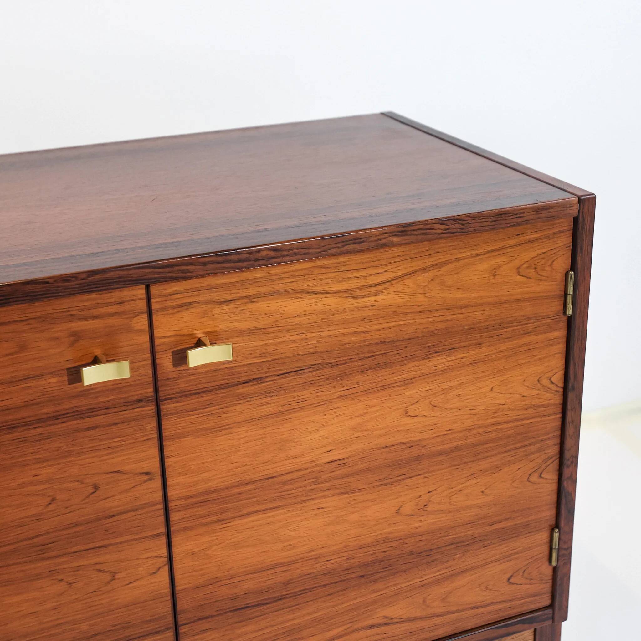 Vintage Swedish commode in rosewood with brass handles.