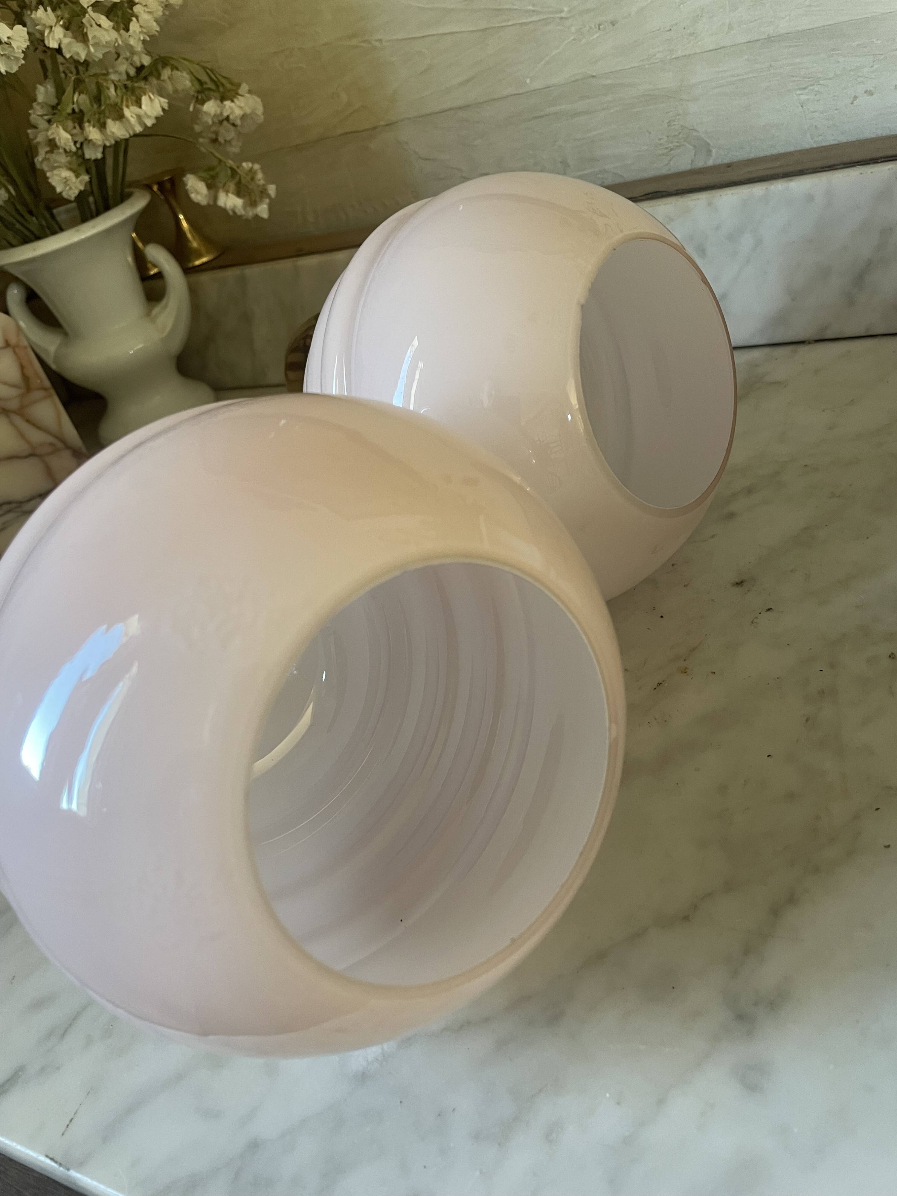 Pair of wall lights in wood, brass, and pink opaline.