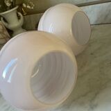 Pair of wall lights in wood, brass, and pink opaline.