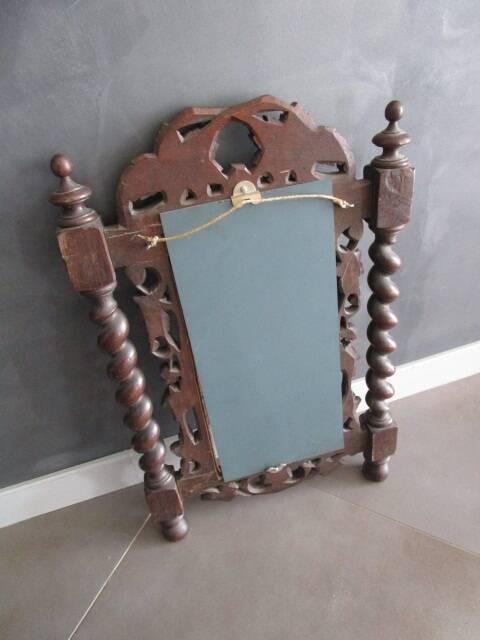Antique carved wooden mirror