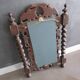 Antique carved wooden mirror