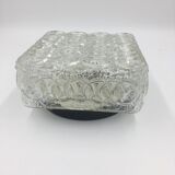 Ceiling lamp in molded glass in relief