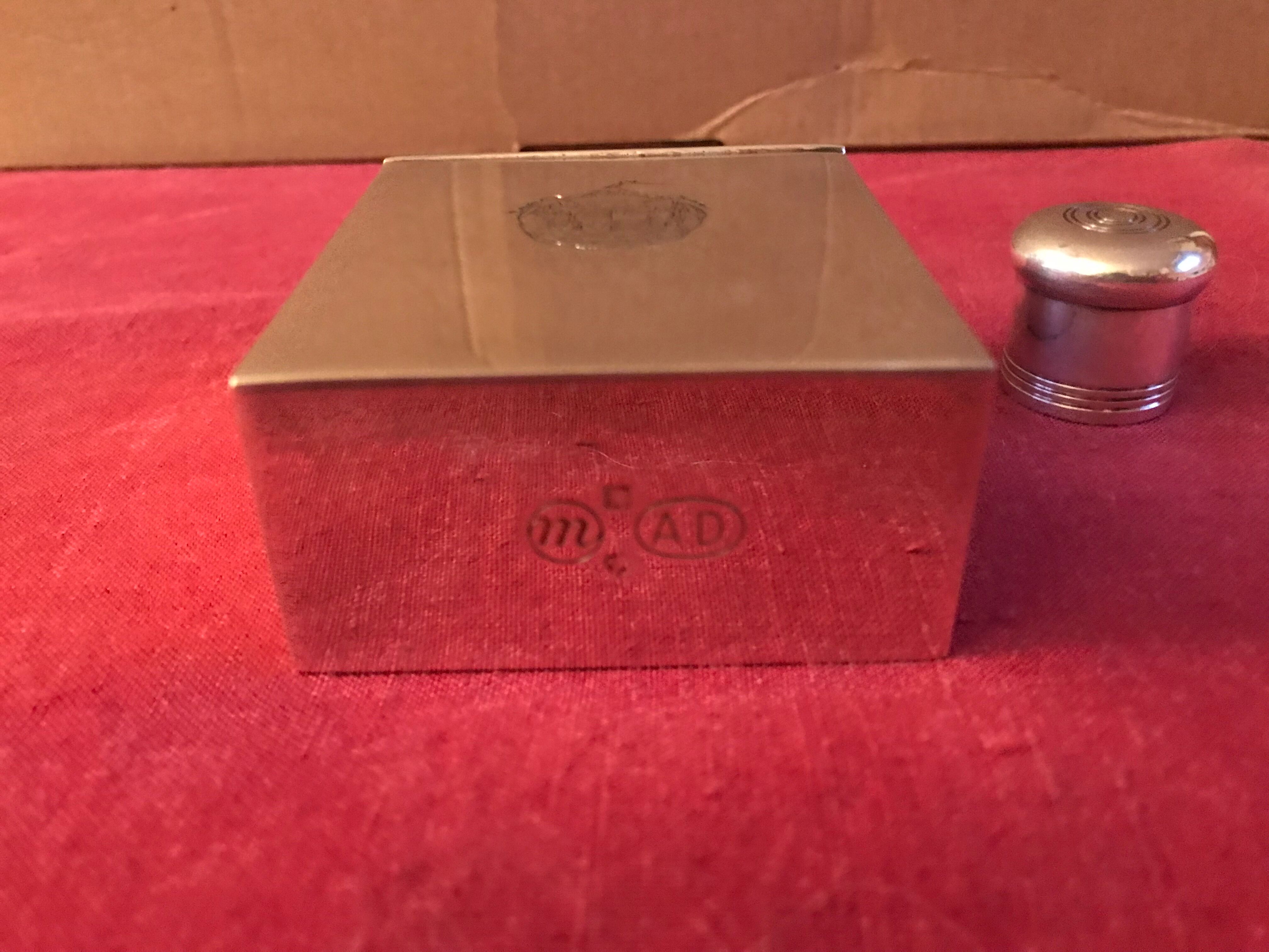 Silver metal perfume bottle