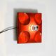 Three beautiful original 1970s Space Age red ceramic wall lamps