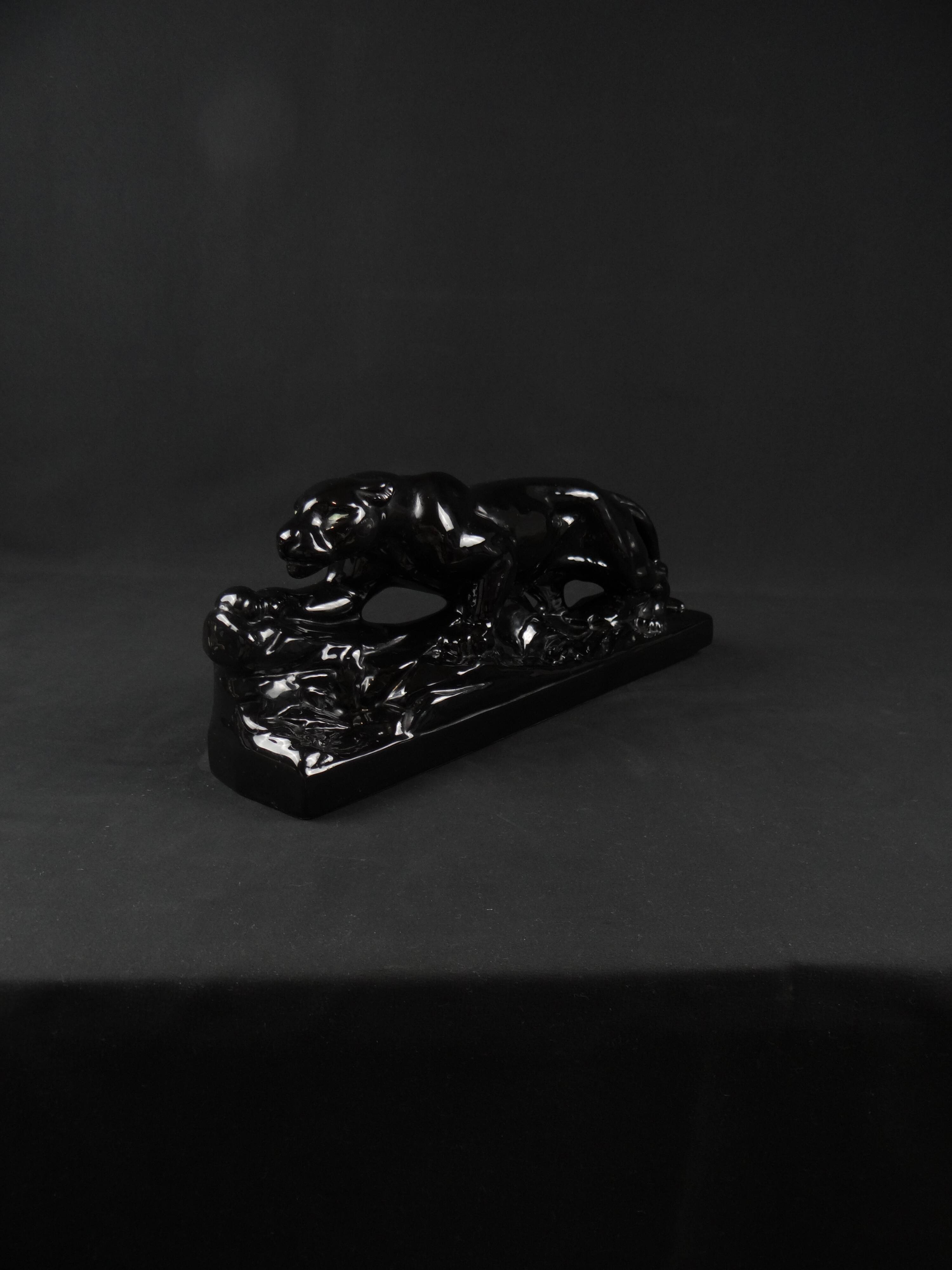 Black ceramic hunting panther from the Art Deco period, circa 1930