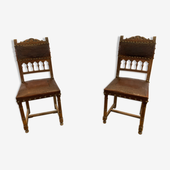 Pair of Henry II wooden and leather chairs