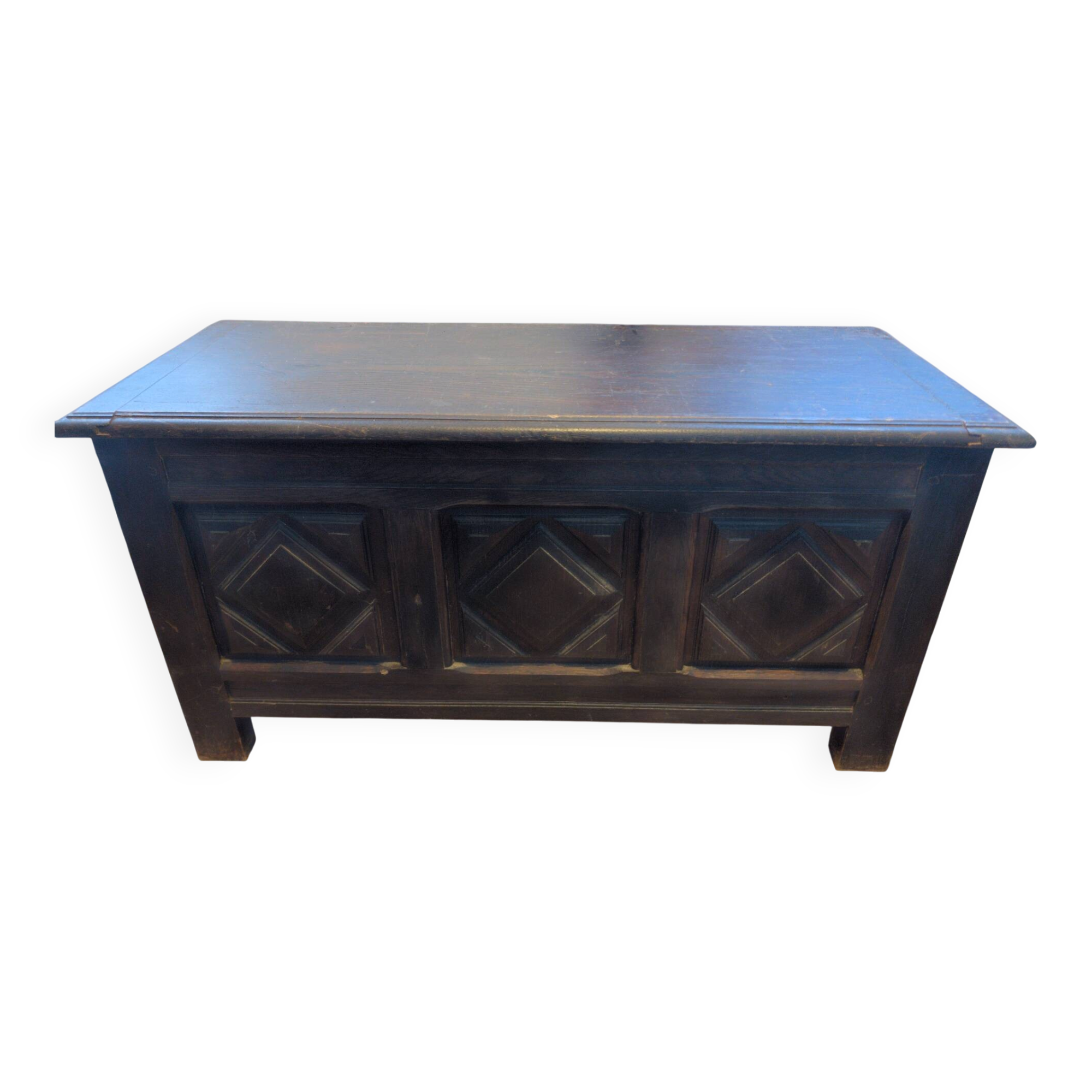 Antique dark wood chest with geometric paneling / pointed detail