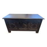 Antique dark wood chest with geometric paneling / tip of