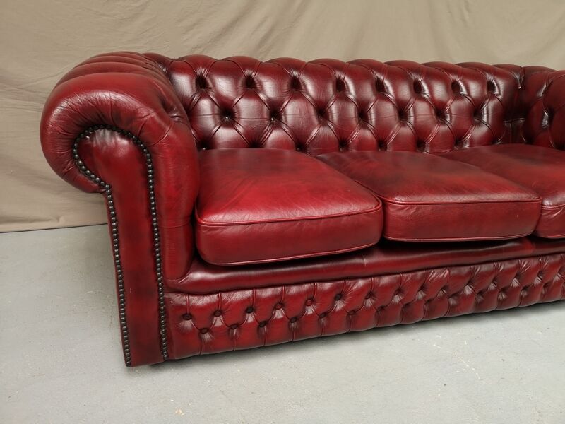 Red leather chesterfield sofa