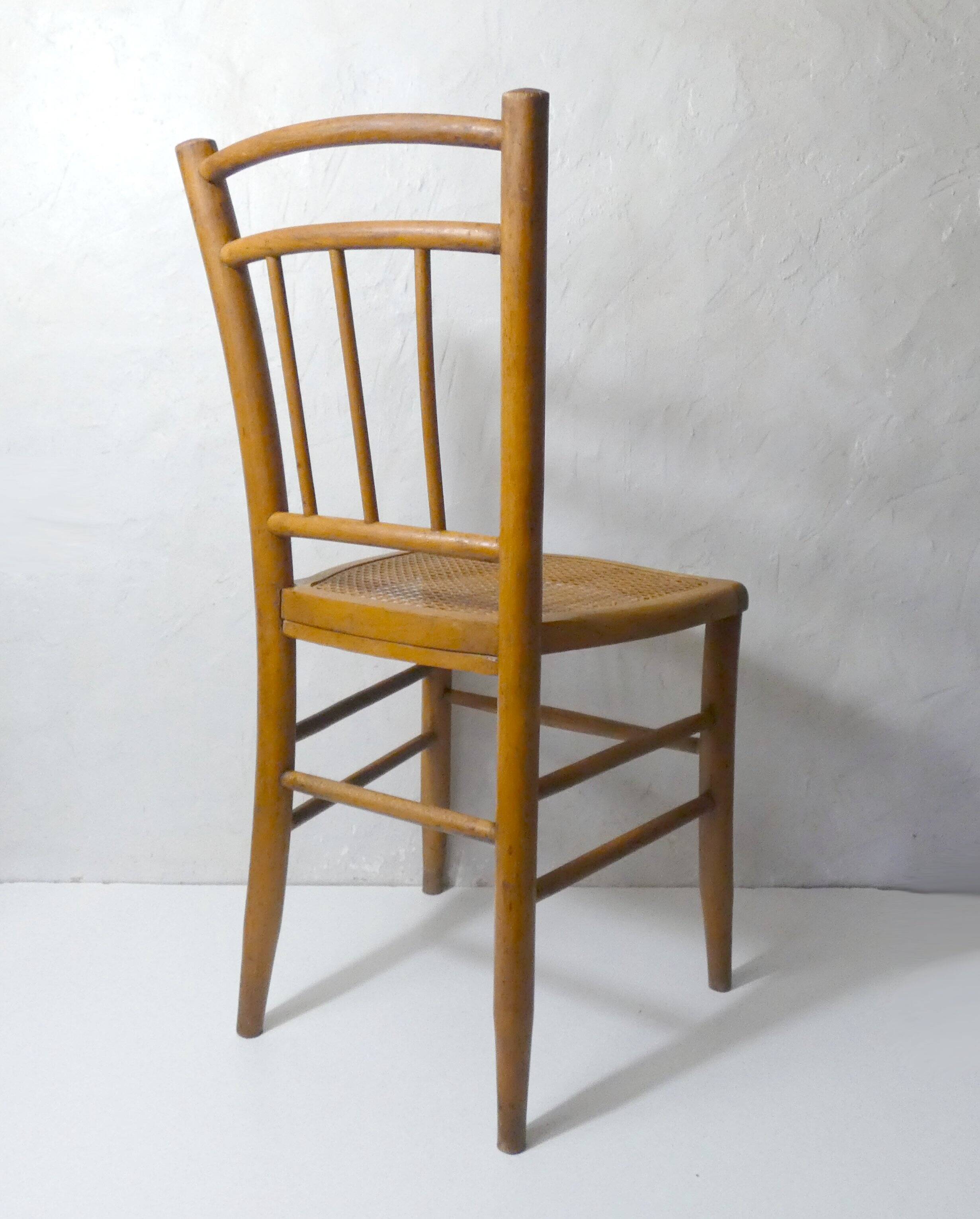 vintage wooden bistro chair with caning