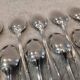 12 silver-plated metal mocha spoons by silversmith Guillaumot, Contours 11.6cm