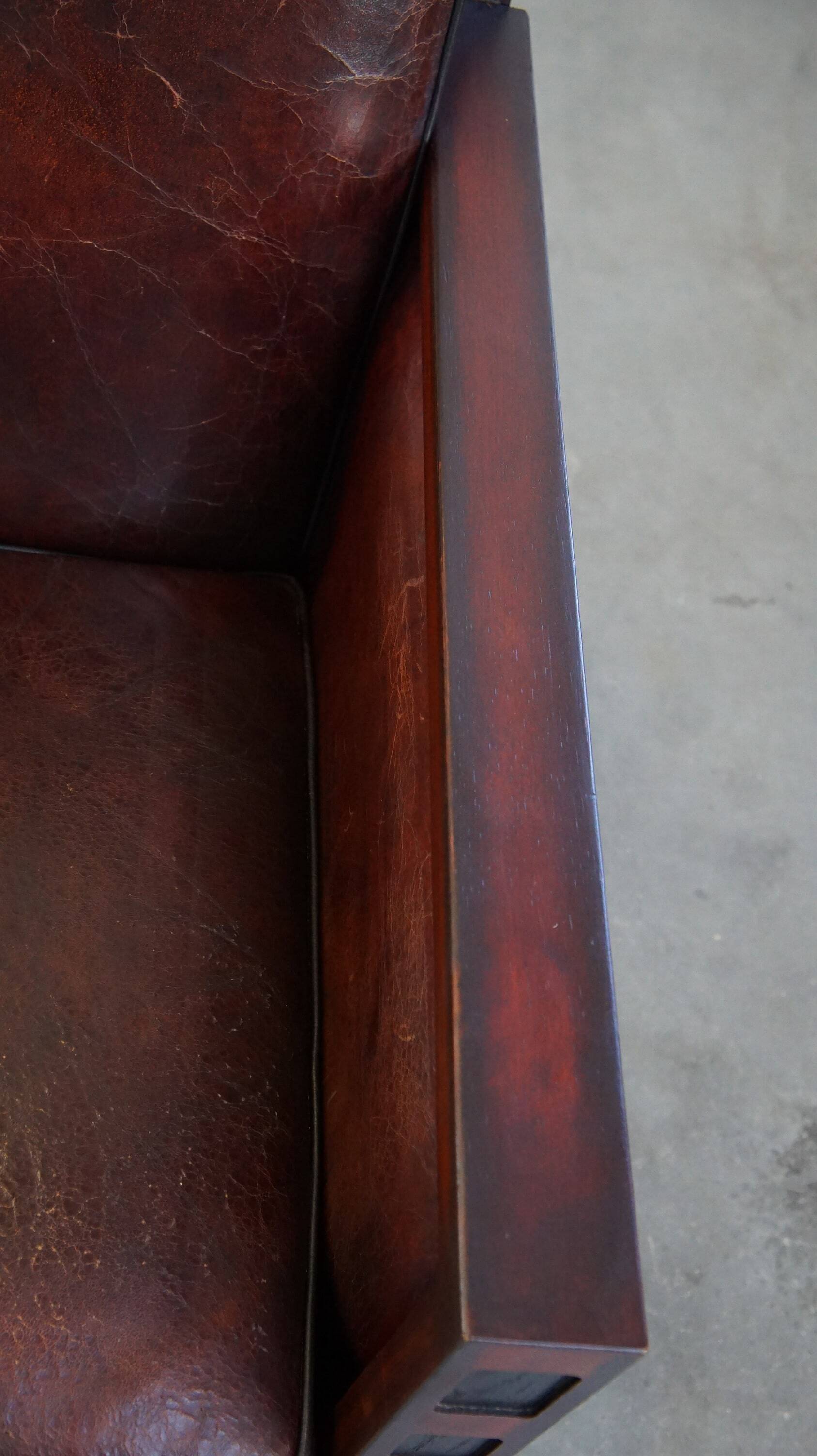 Sheepskin Art Deco design armchair combined with wood