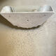 "Arlus" wall light in Art Deco style made of plaster and smoked glass.