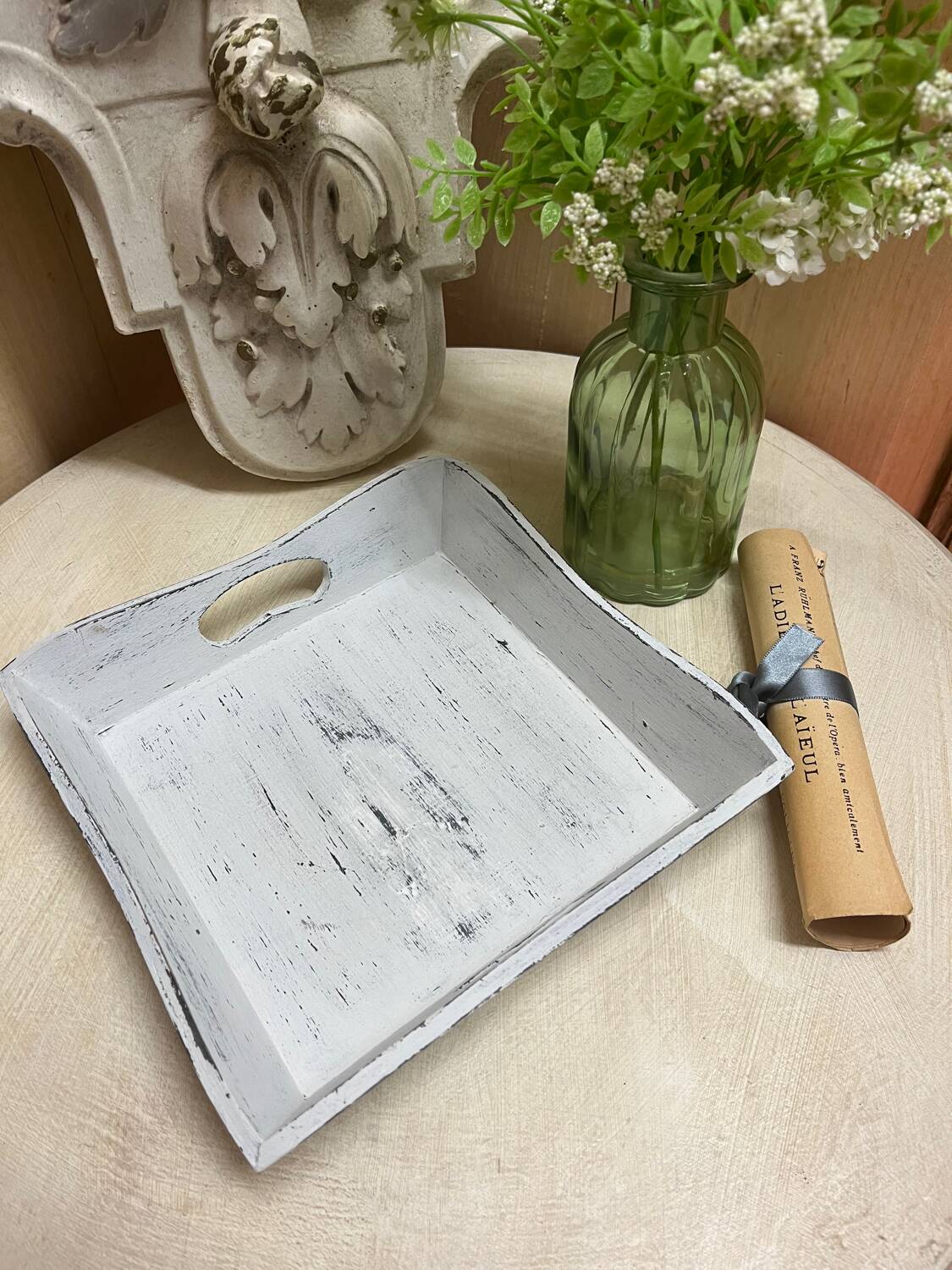 Old wooden tray with aged white patina