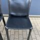 4 black Cassina Cab chairs by Mario Bellini