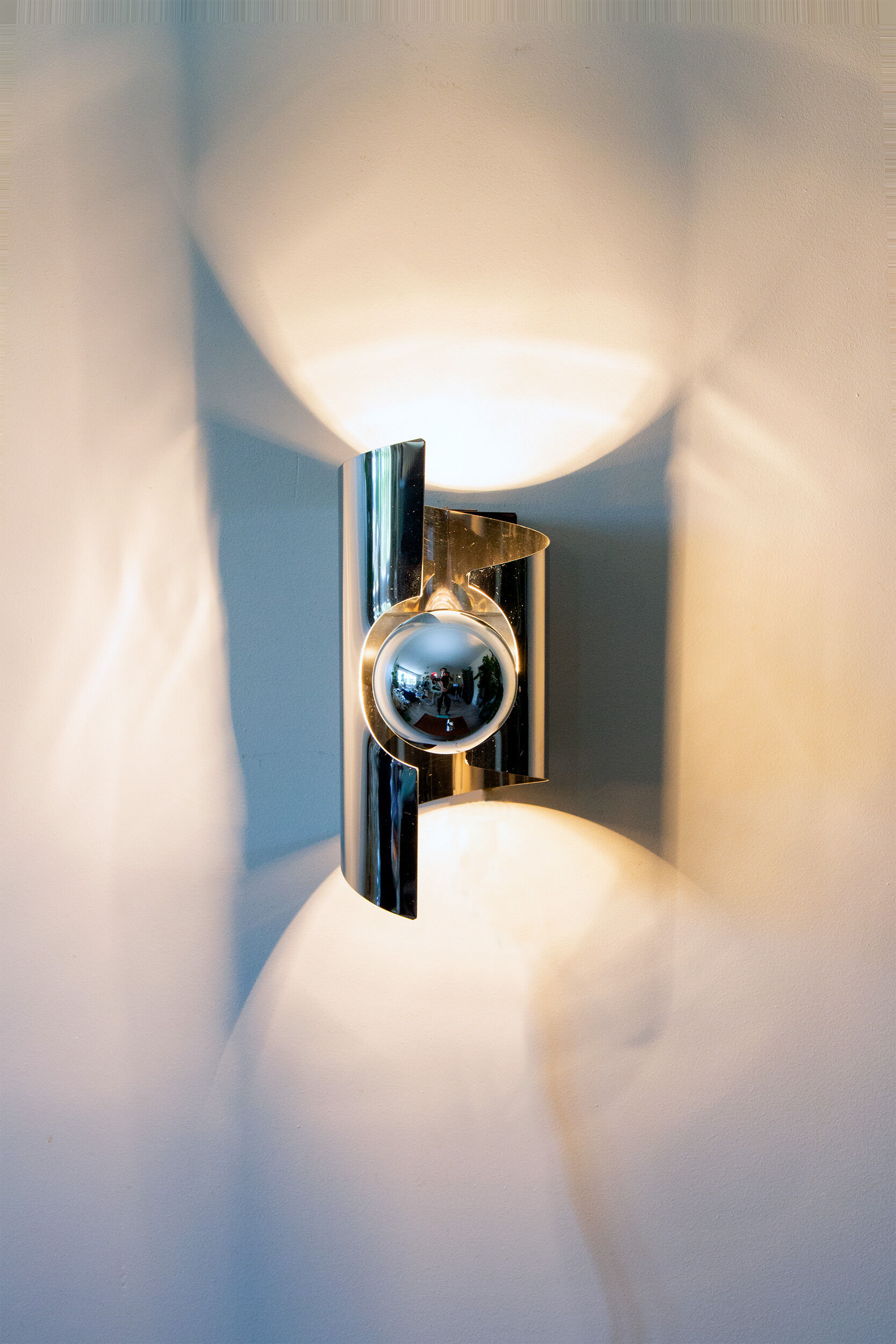 Pair of twisted wall lamps, chromed steel, year 70