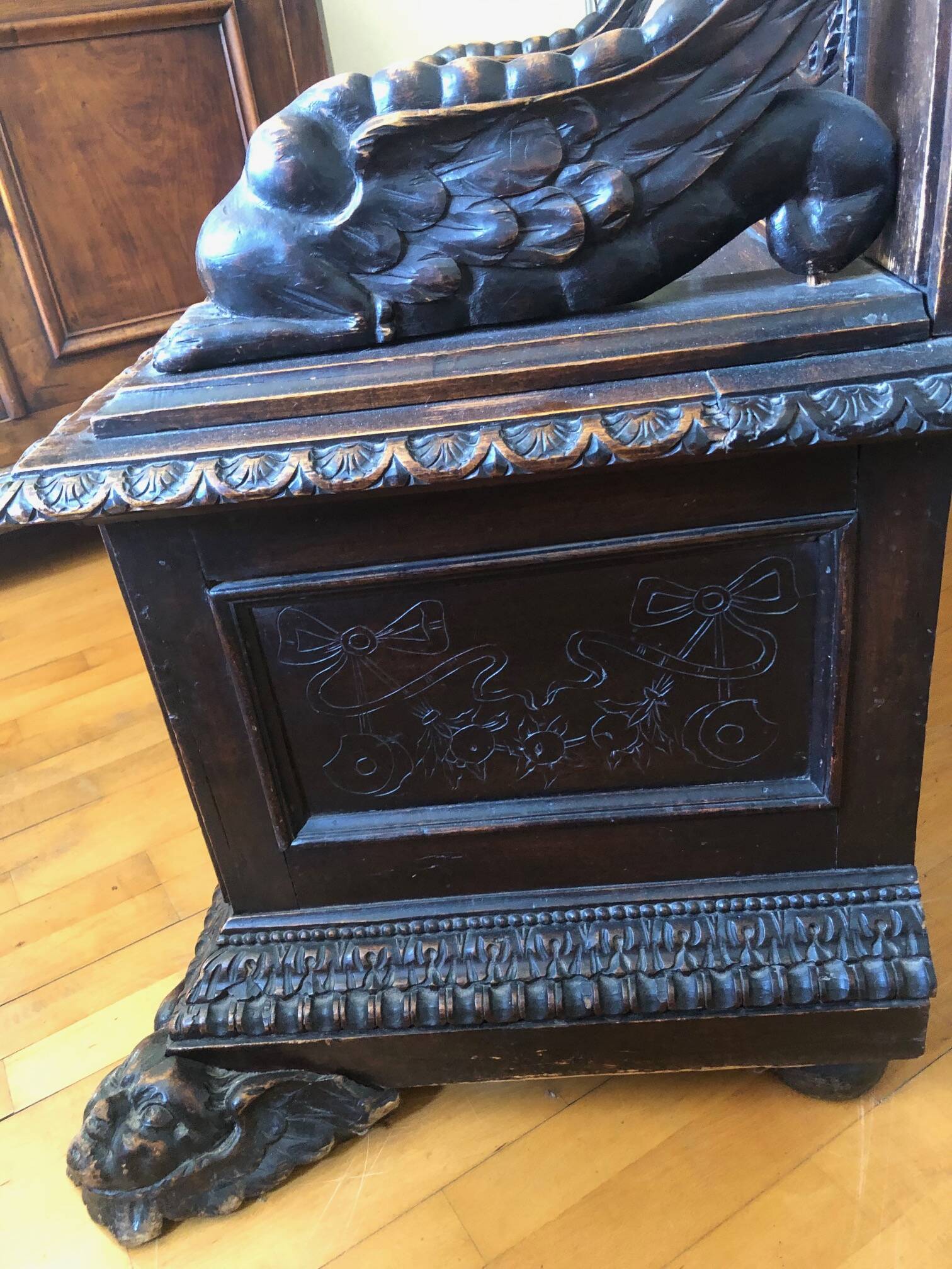 Solid wood chest, carved, with backrest, feet and armrests