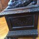 Solid wood chest, carved, with backrest, feet and armrests