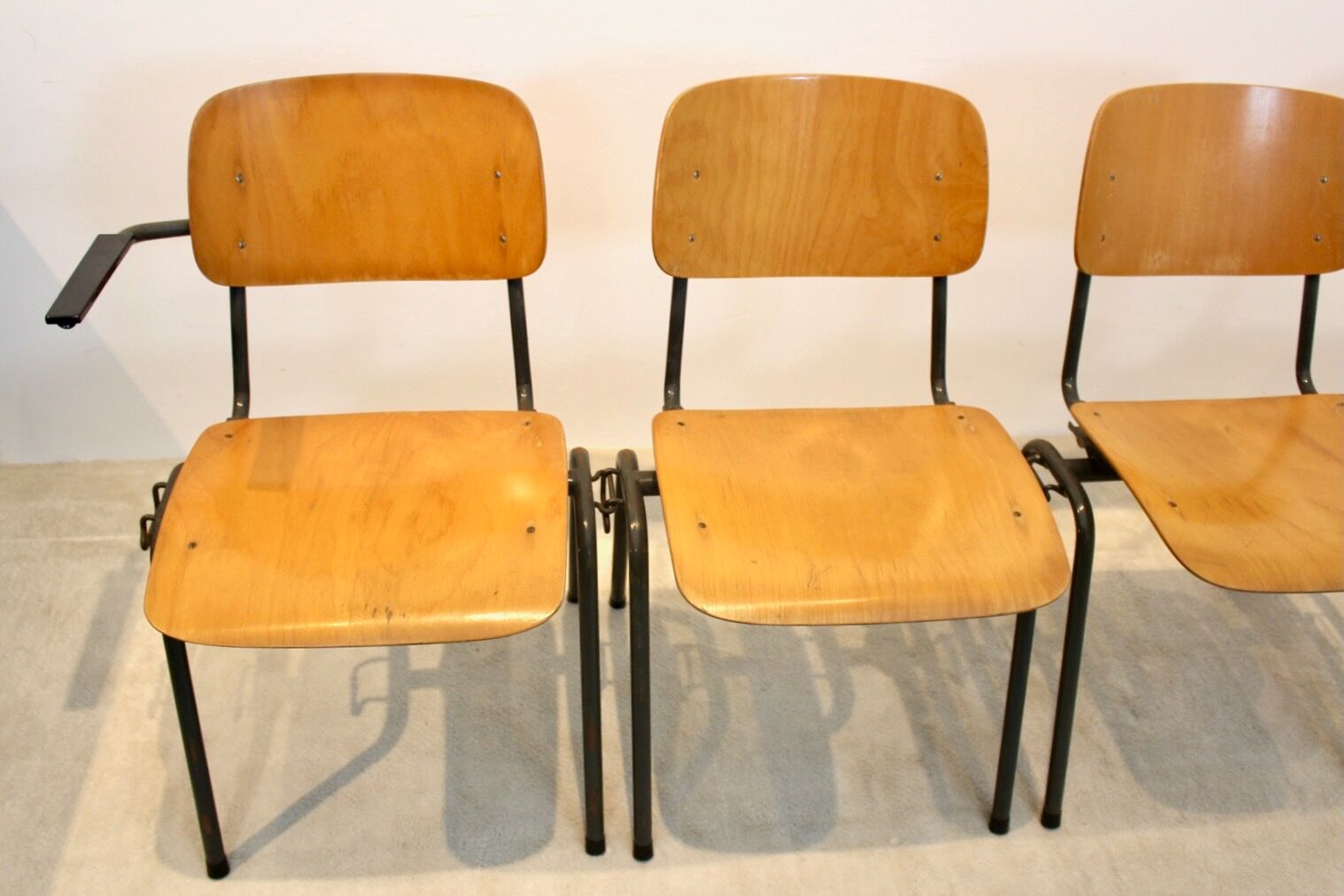 School bench consisting of 4 stackable chairs in industrial plywood by Marko Holland
