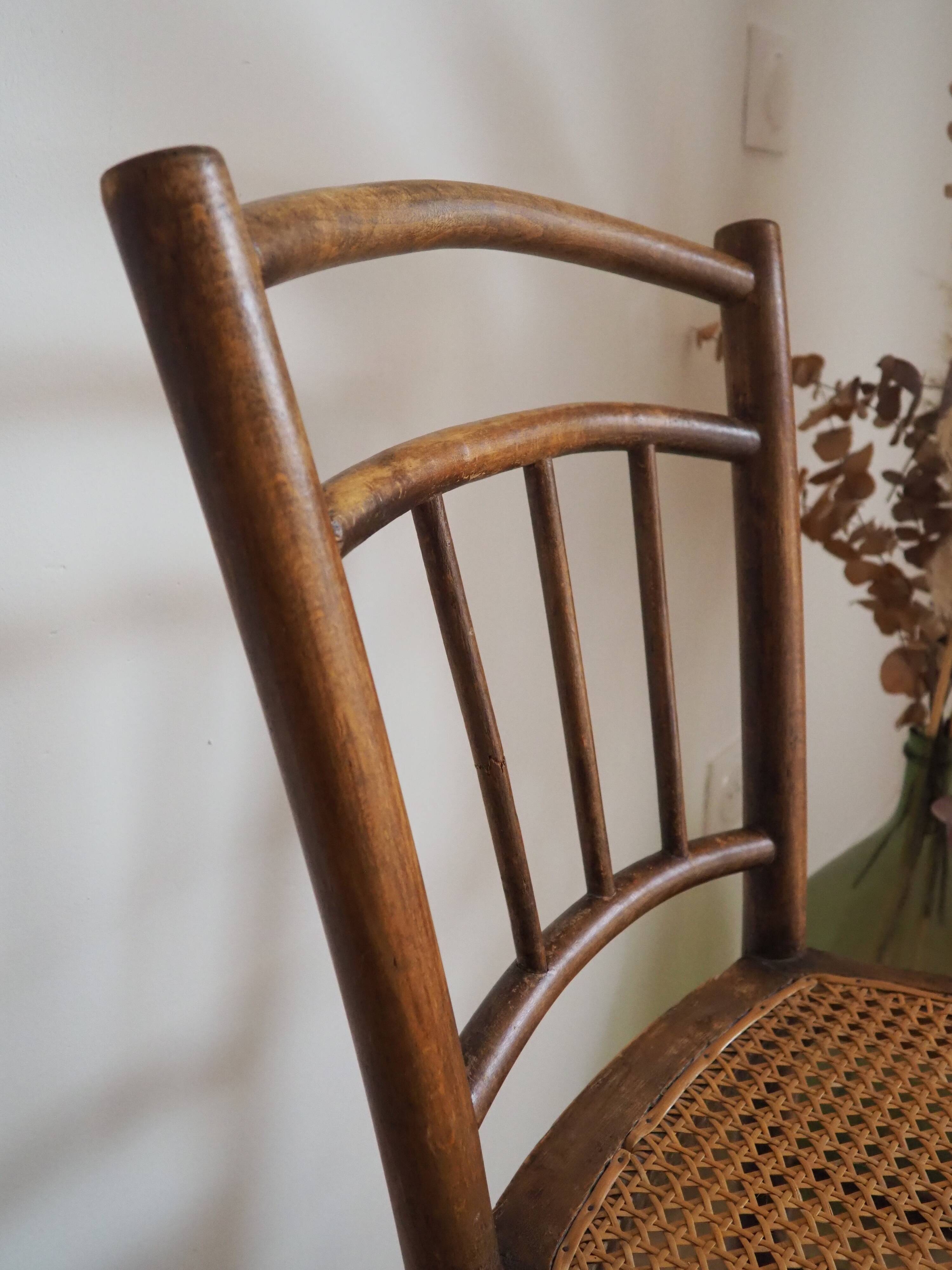 Wooden chair with cane seat