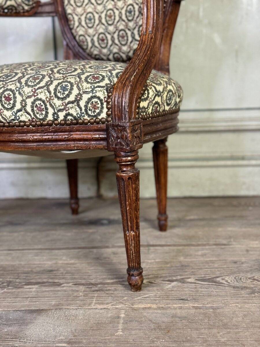 Pair Of Louis XVI Armchairs In Carved Wood, 18th Century