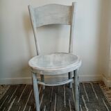 White antique children's chair in patinated wood