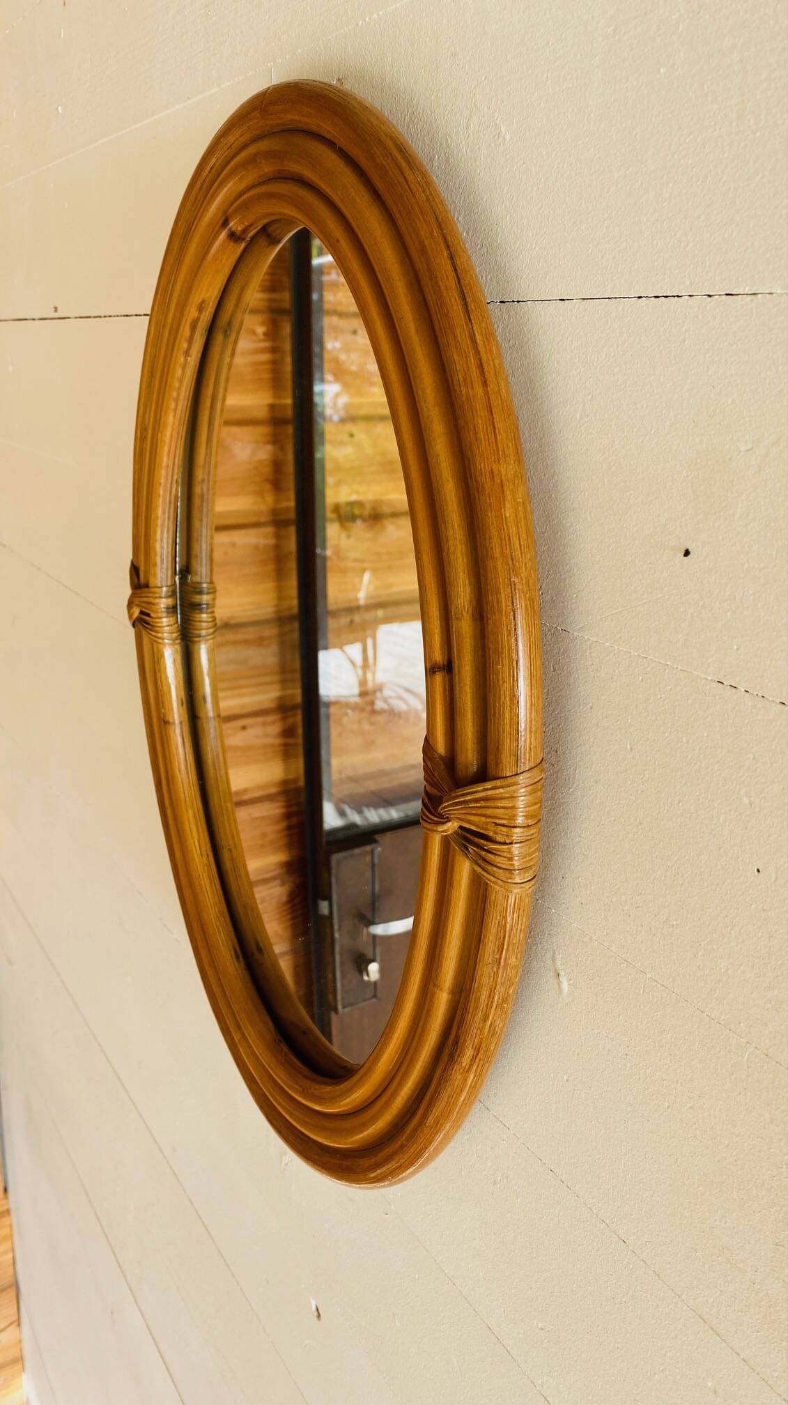 Vintage oval rattan mirror