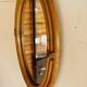 Vintage oval rattan mirror