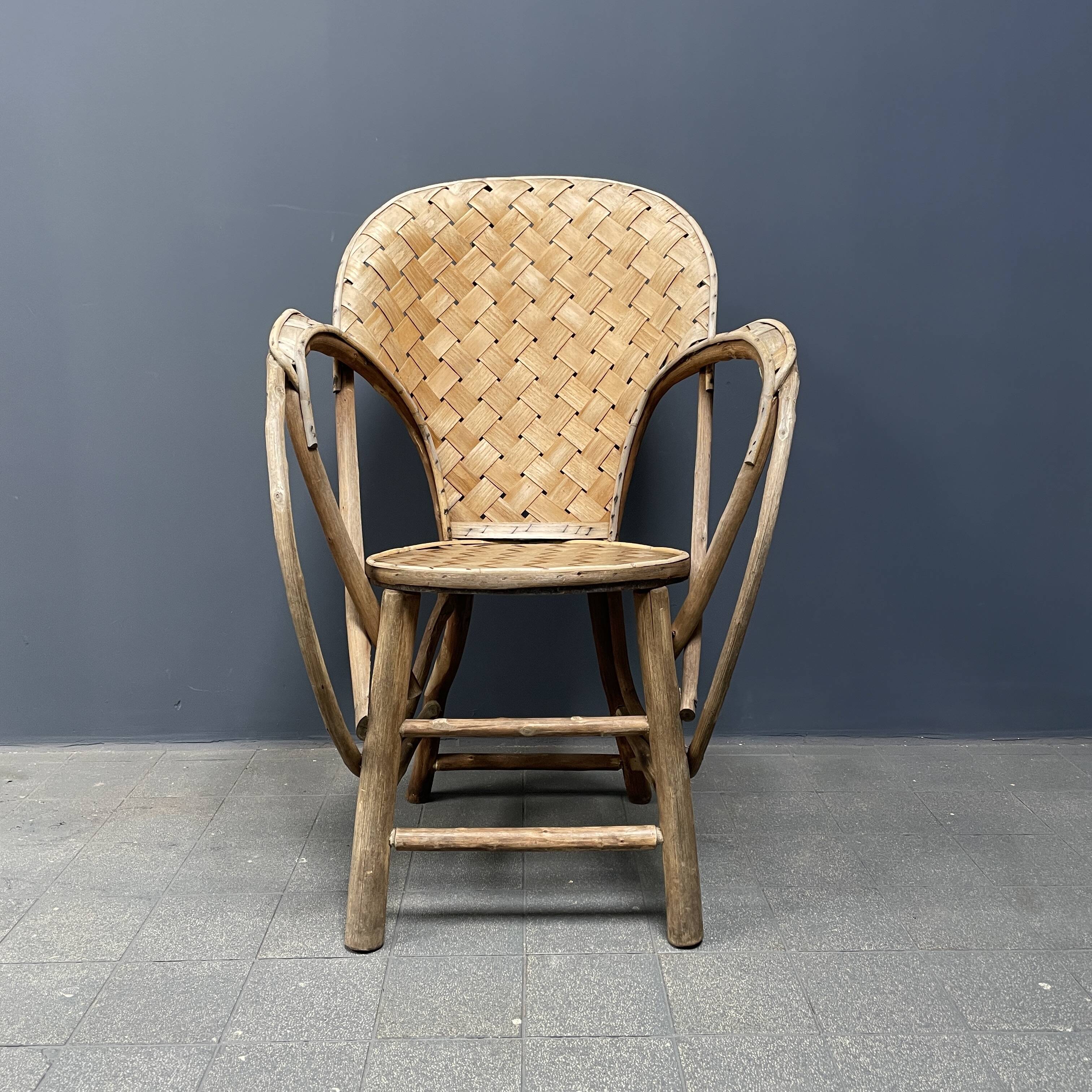 Braided folk art wooden armchair
