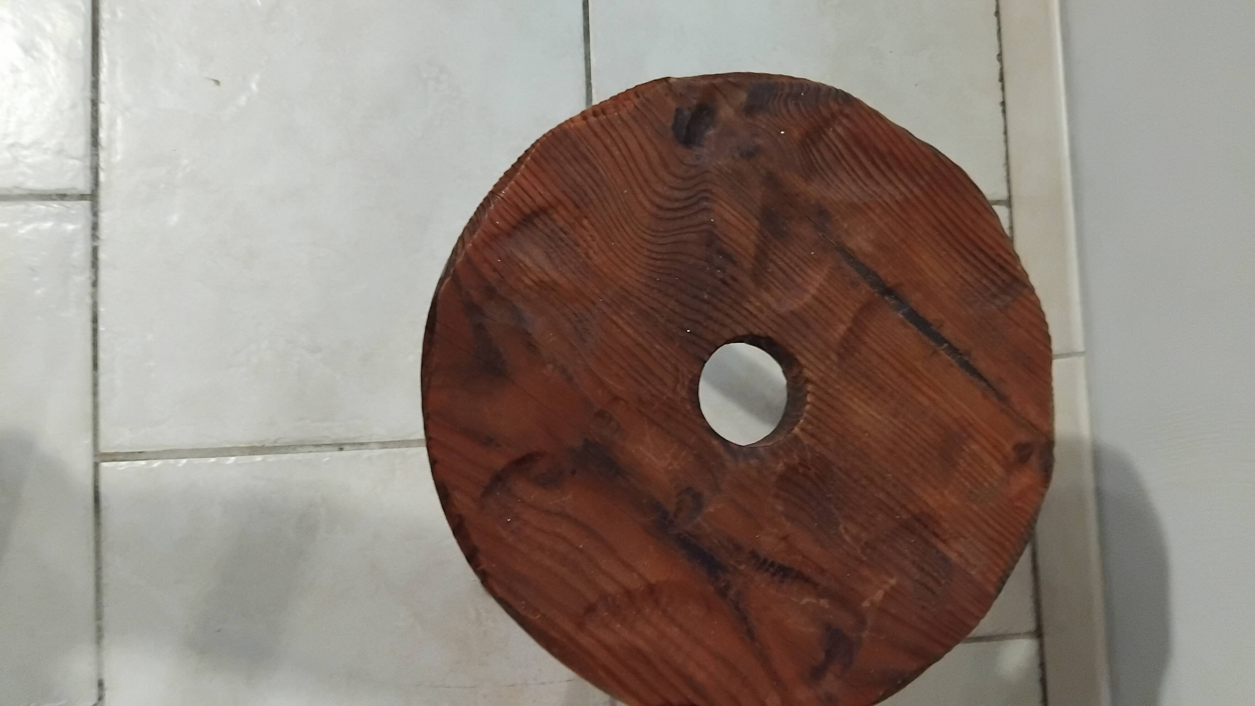 Vintage wooden perforated stool