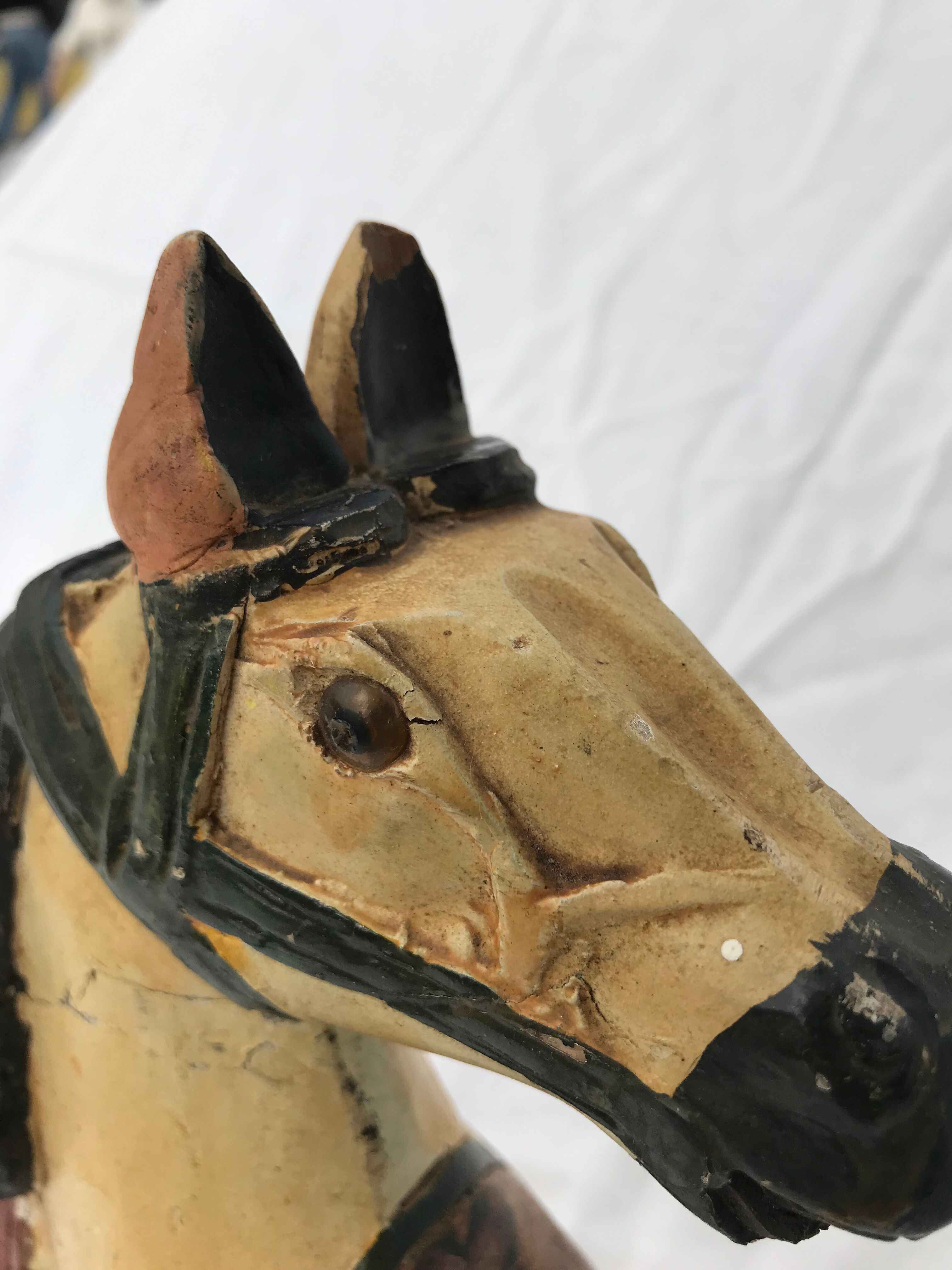 Wooden horse with period ironwork support