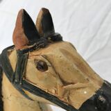 Wooden horse with period ironwork support