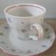 Lot of 5 coffee cups and porcelain saucers