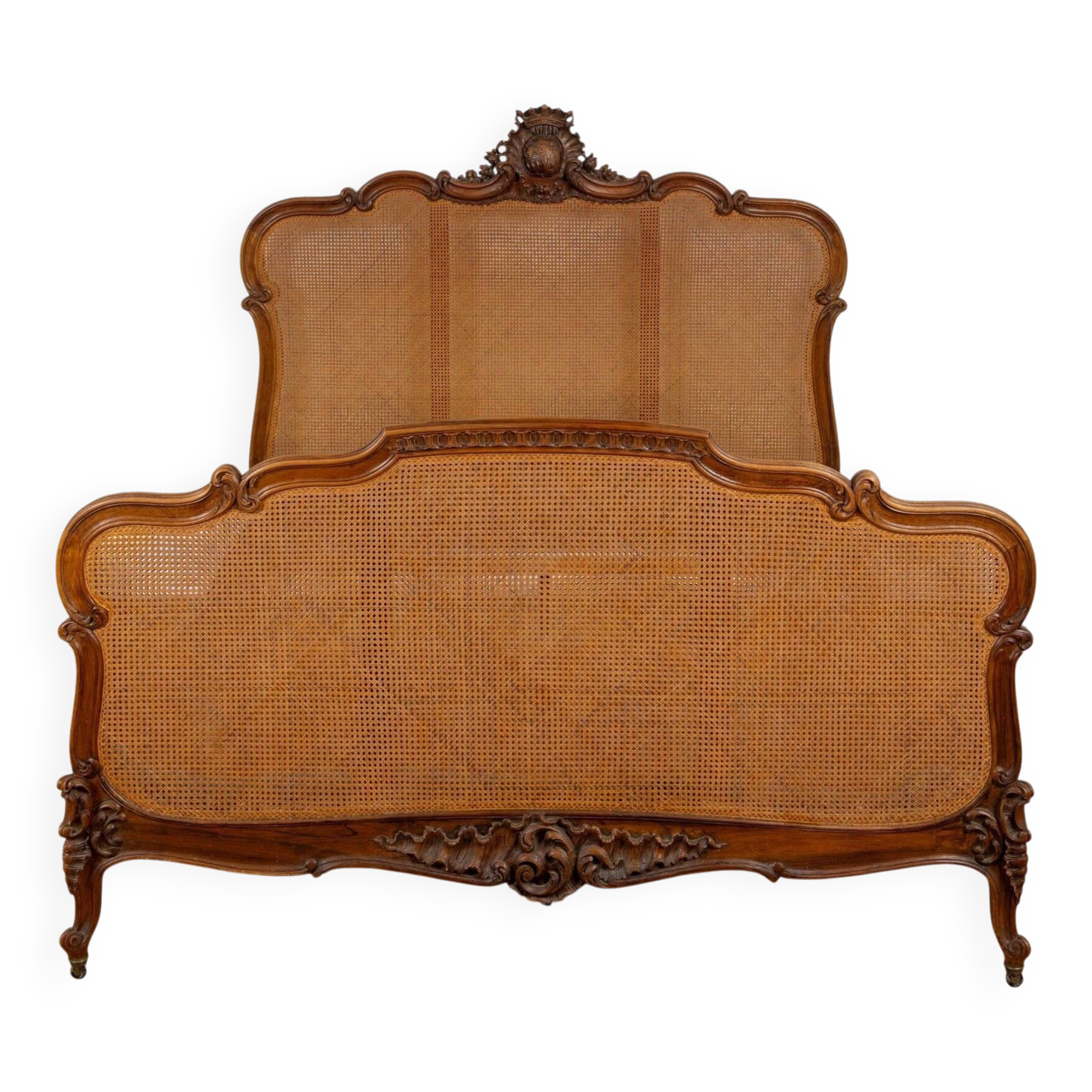Louis XV style bed in carved and caned beech