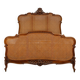 Louis XV style bed in carved and caned beech