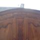 Louis XV Nantaise wardrobe carved with grape clusters, gendarme hat in fine cherry wood, late 19th century.
