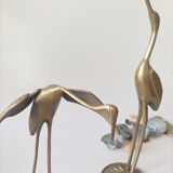 Brass heron duo