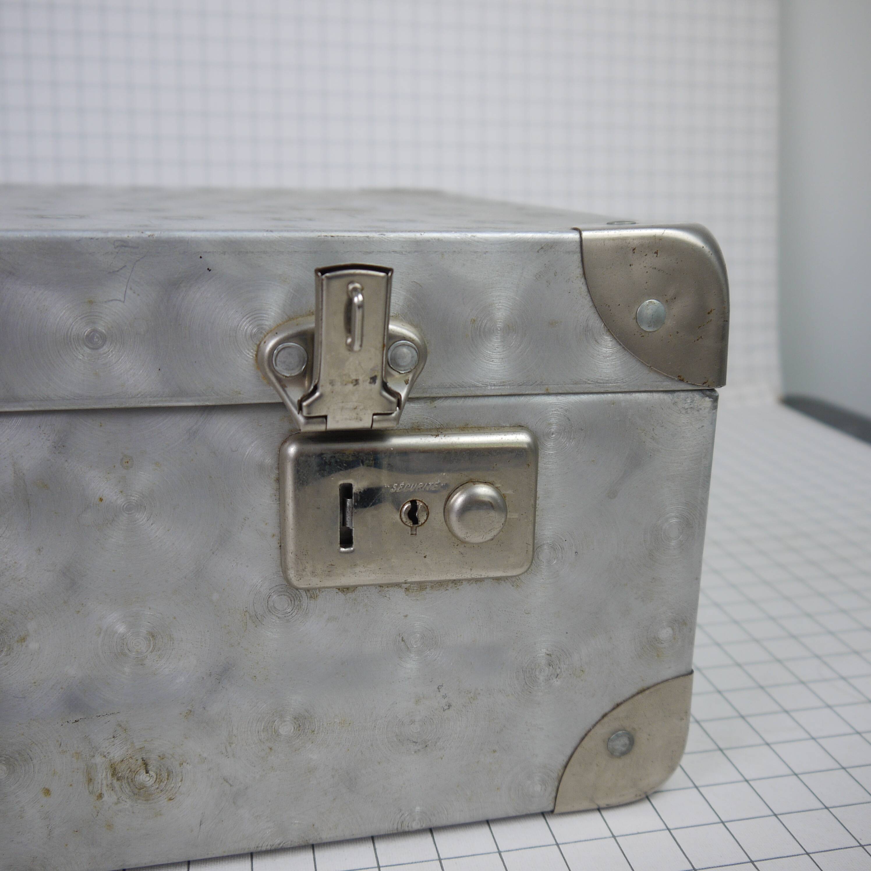 Metal case and leather handle