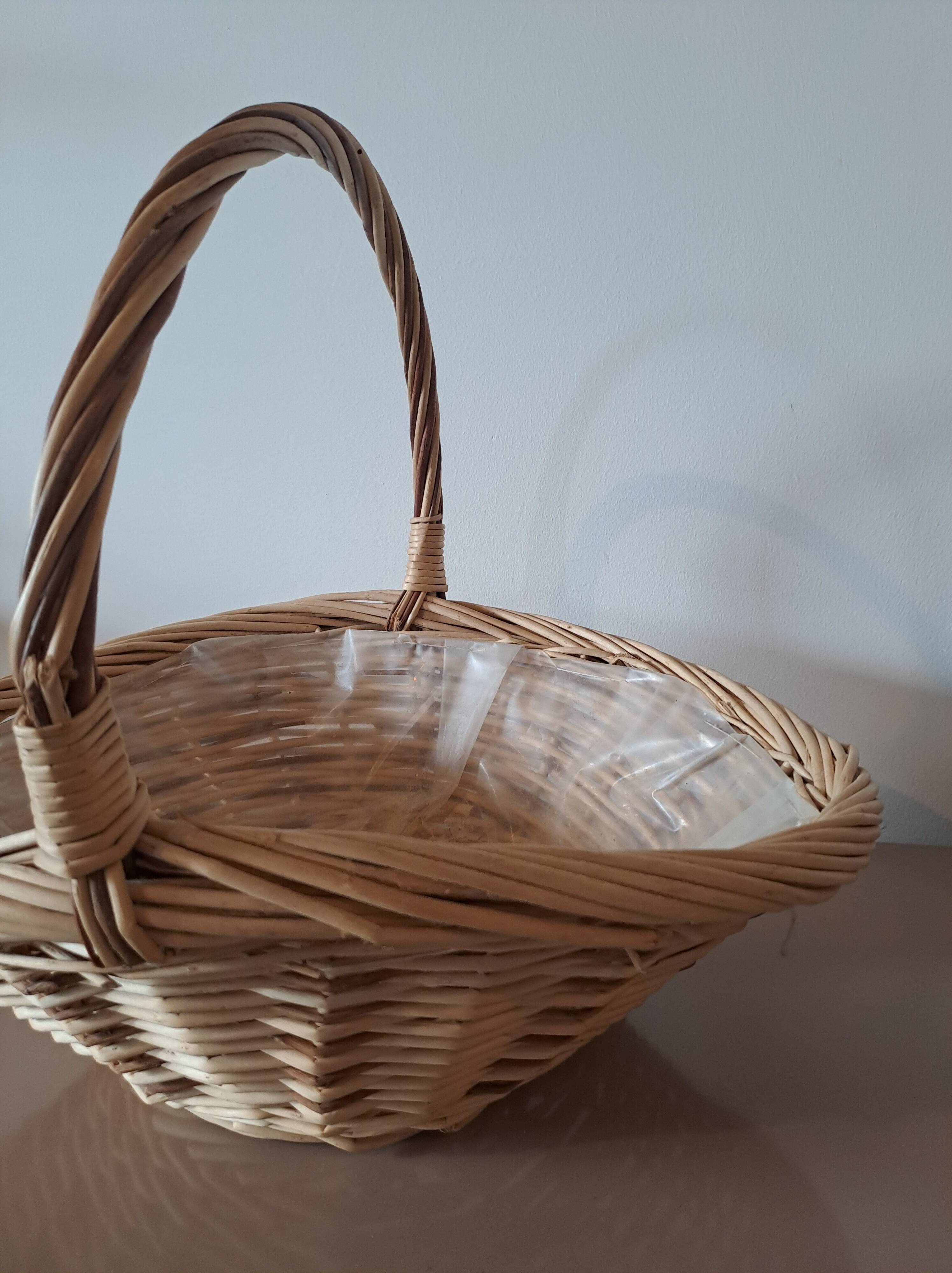 Natural wicker basket with twisted handle – vintage decorative basket