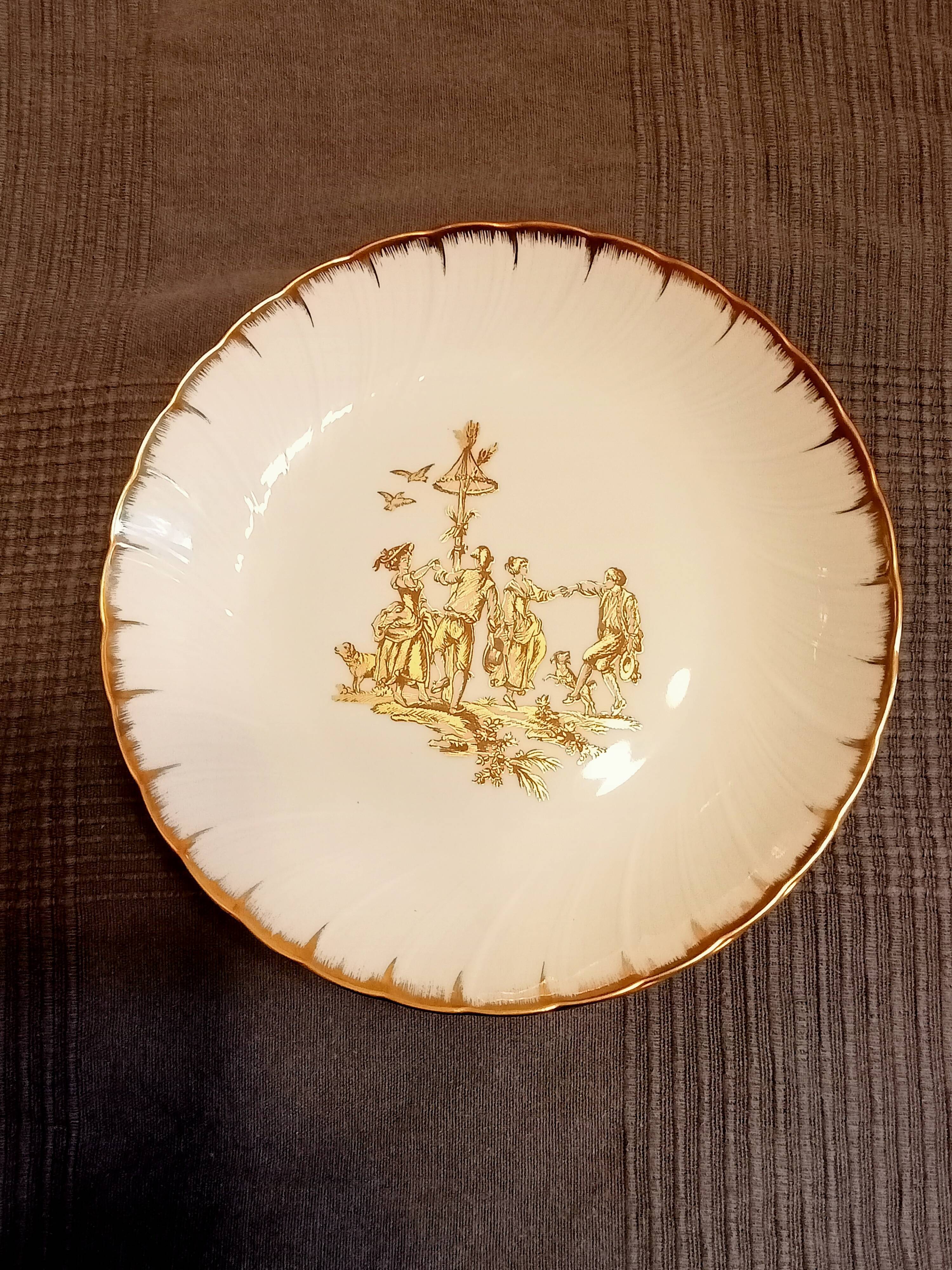 Limoges porcelain signed Bernardaud with gold border and central decoration country scenes