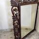 Antique carved wooden mirror