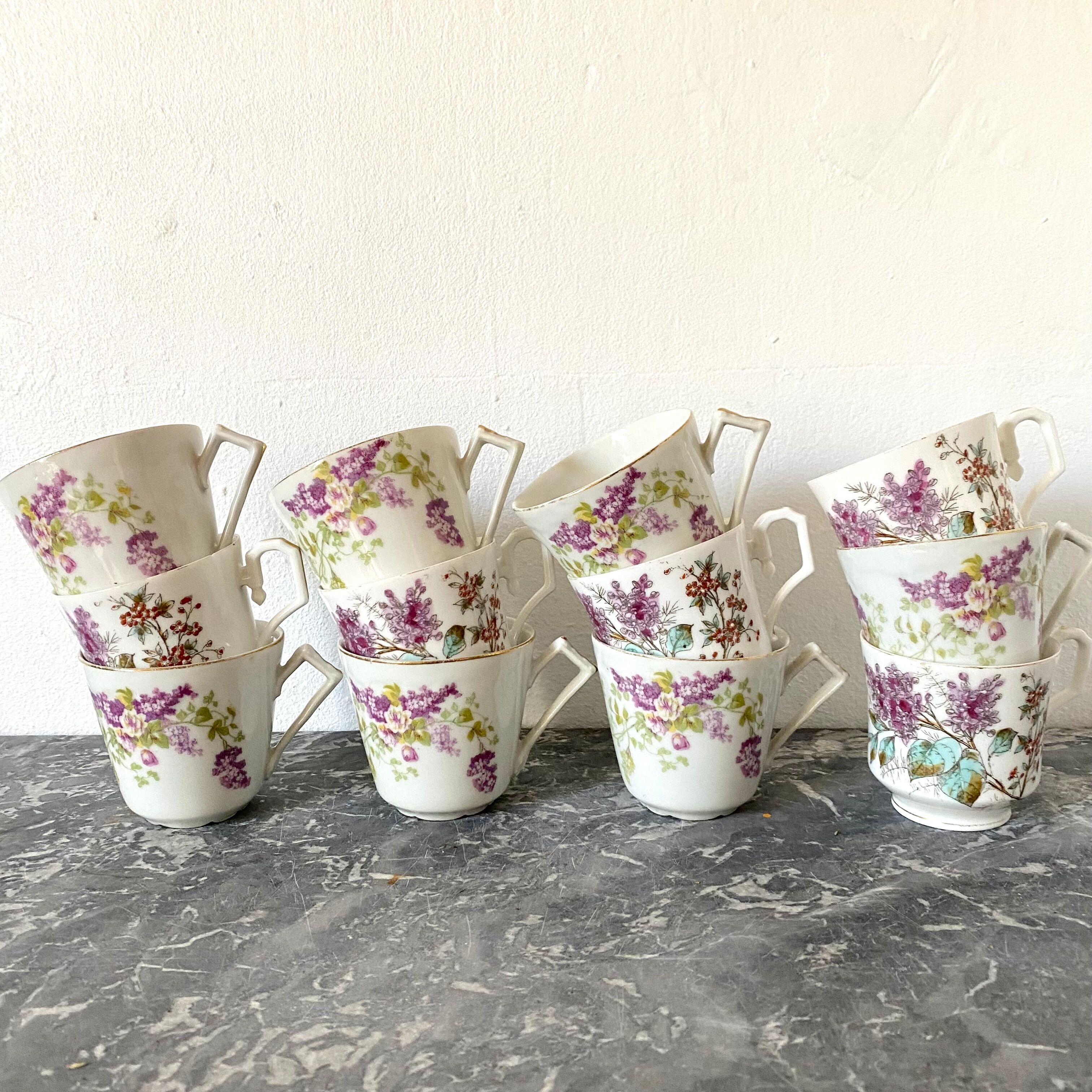 Antique flowered porcelain cups mismatched